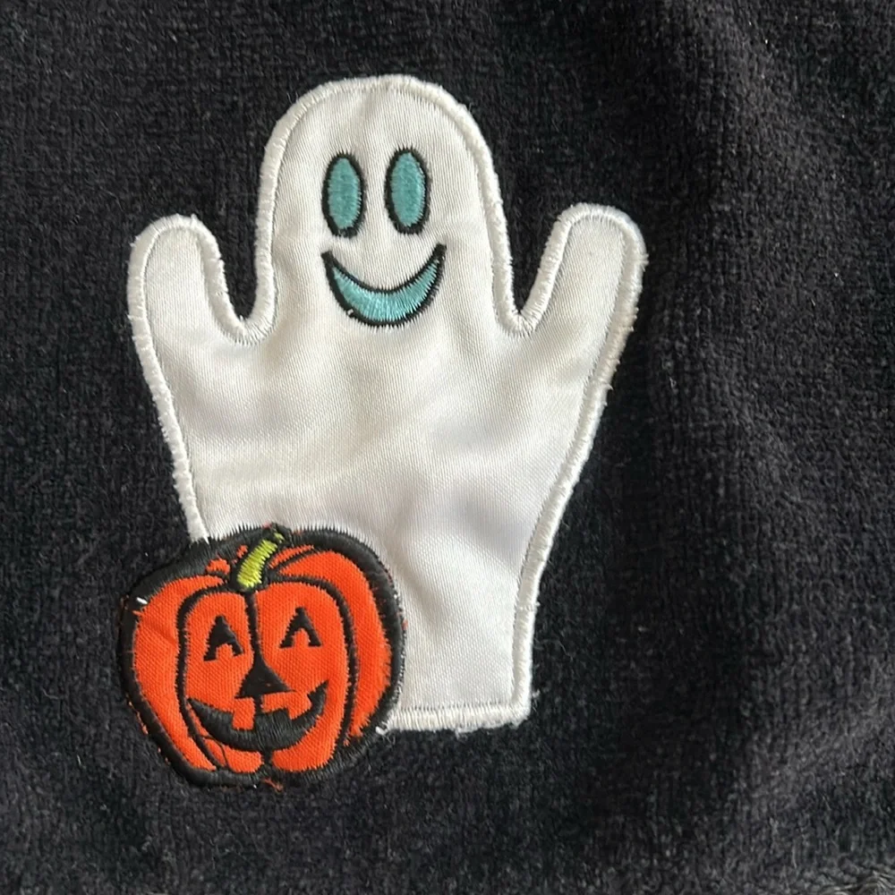 Halloween hand towels with a friendly ghost and pumpkin appliqué
